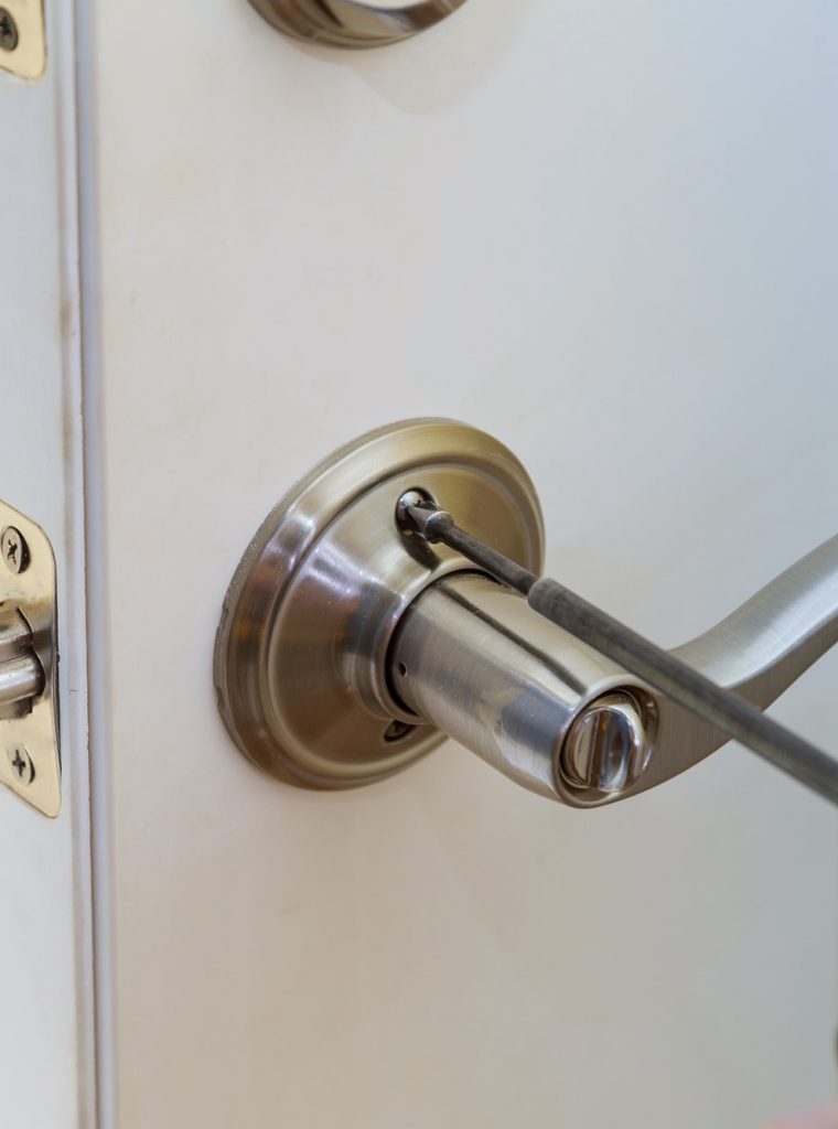 handyman-repair-the-door-lock-in-the-worker-s-hands-installing-new-door-locker.jpg